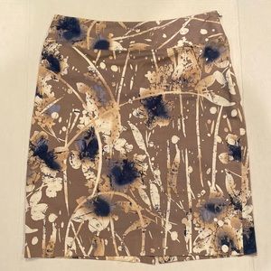 Alfani Skirt Size 6P. Taupe with splash of white and blues.